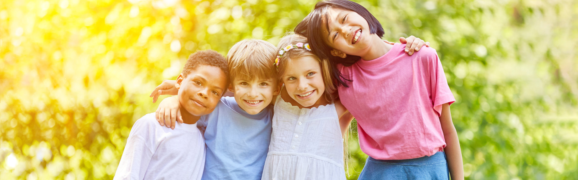 children outdoors smiling