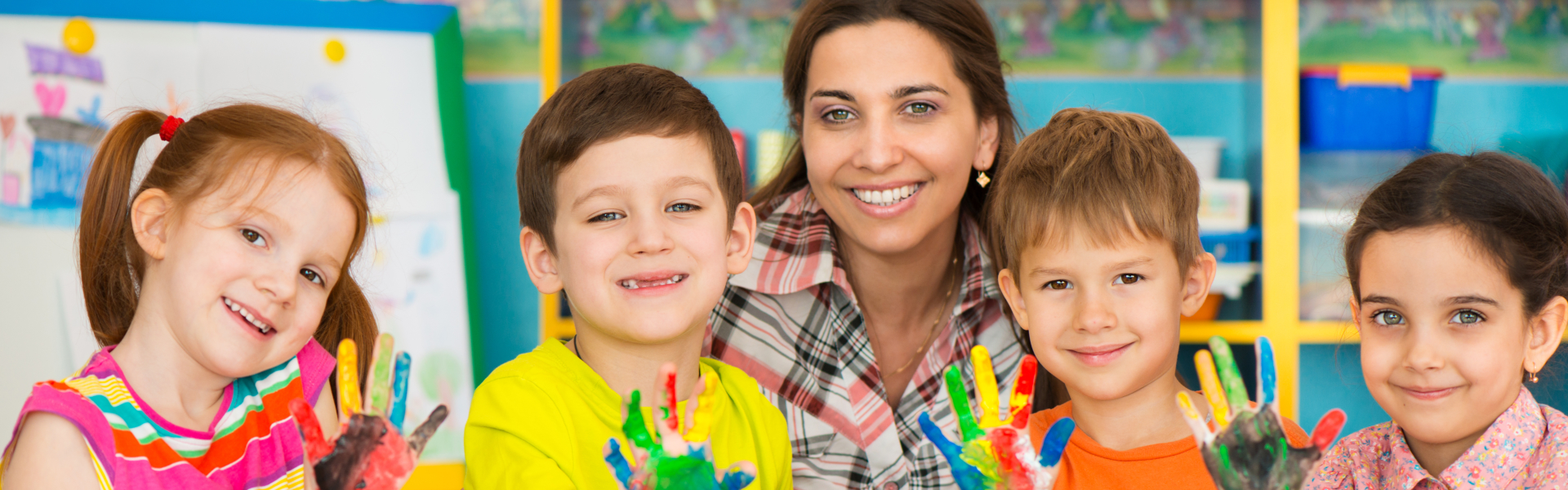 children with paint on hands